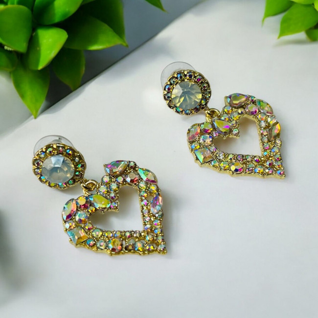 Серьги под цвет золота со стразами "Сердце" /4х2,5см./, №10709 Серьги под цвет золота со стразами "Сердце" /4х2,5см./, №10709