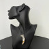 Кулон на шнурке белый клык с металл. наконечником "Волк" /5,3х2,4см./, 25-438,37-277